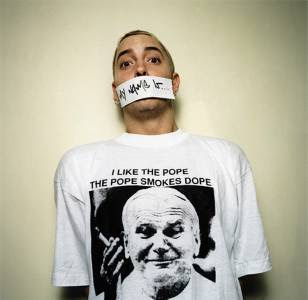 As worn by Eminem - I Like The Pope The Pope Smokes Dope shirt. PYGOD.COM