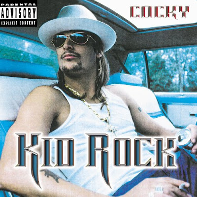 Kid Rock is cocky wearing his redneck white trash wifebeater.